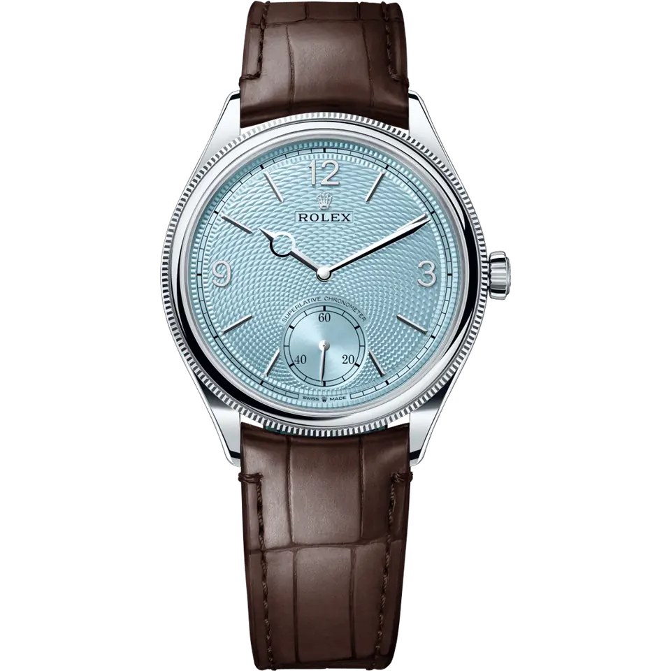 Rolex Perpetual 1908 52506 with an ice blue guilloché dial with small seconds and a fluted platinum bezel on a brown alligator strap, front view