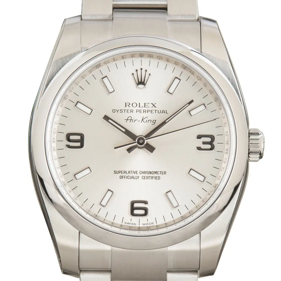 Rolex Air-King 114200 with a silver dial with 3, 6 and 9 numerals and smooth steel bezel on an Oyster bracelet, a pre-owned example, studio close-up of the case