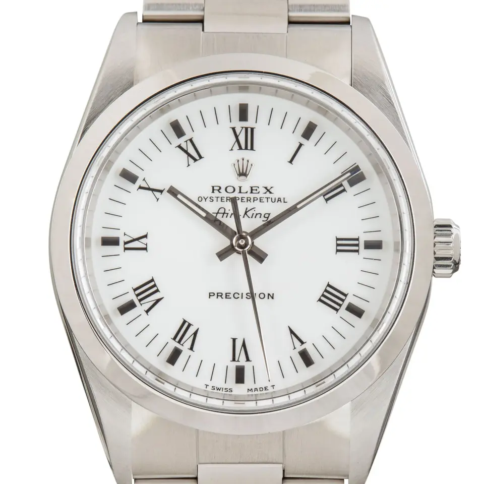 Rolex Air-King 14000 with a white dial with Roman numerals and smooth steel bezel on an Oyster bracelet, a pre-owned example, studio close-up of the case