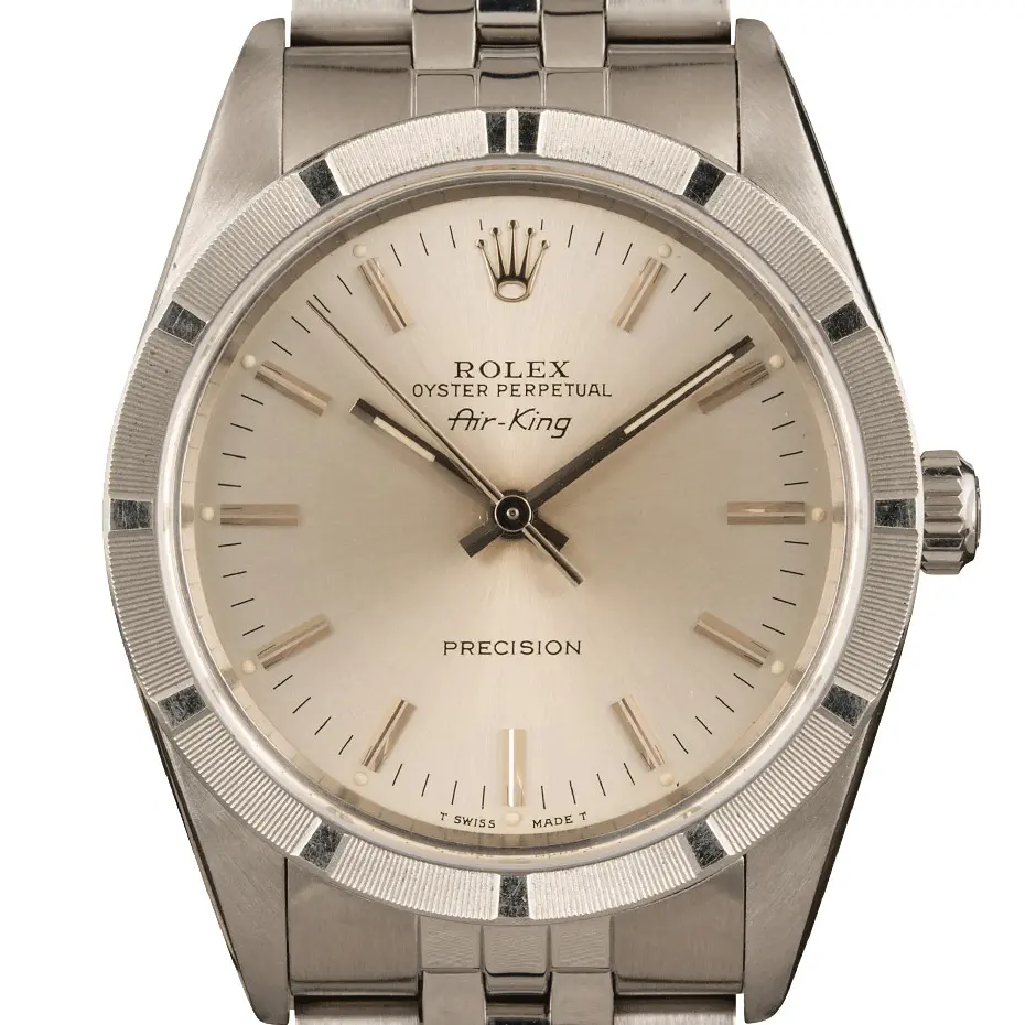 Rolex Air-King 14010 with a silver dial and engine-turned steel bezel on a Jubilee bracelet, a pre-owned example, studio close-up of the case