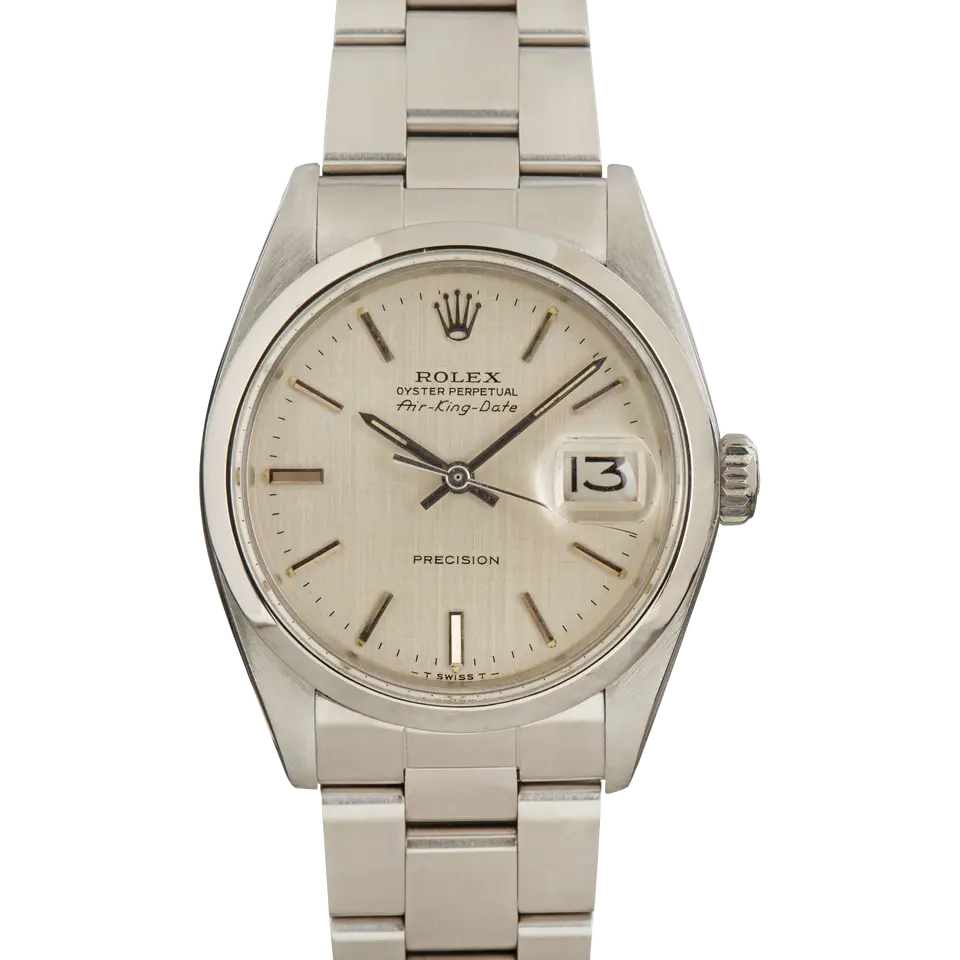 Rolex Air-King Date 5700 with a silver dial with date window and smooth steel bezel on an Oyster bracelet, a pre-owned example, front view of the whole watch