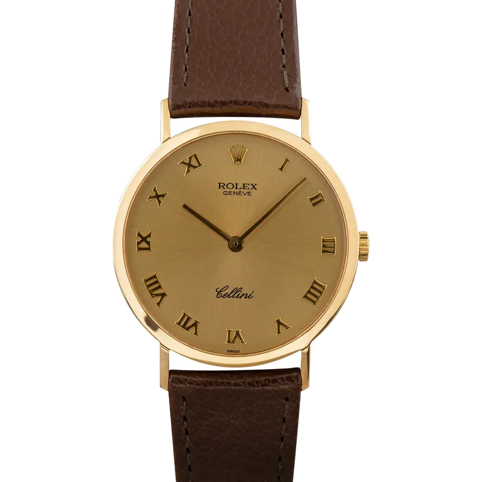 Rolex Cellini 4112 with a champagne Roman-numeral dial, round yellow gold case on a brown leather strap, a pre-owned example, front view of the whole watch