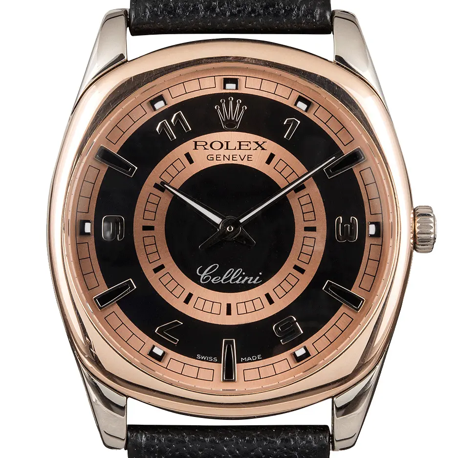 Rolex Cellini Danaos 4243 with a salmon and black dial in a cushion-shaped white and rose gold case on a black leather strap, a pre-owned example, studio close-up of the case