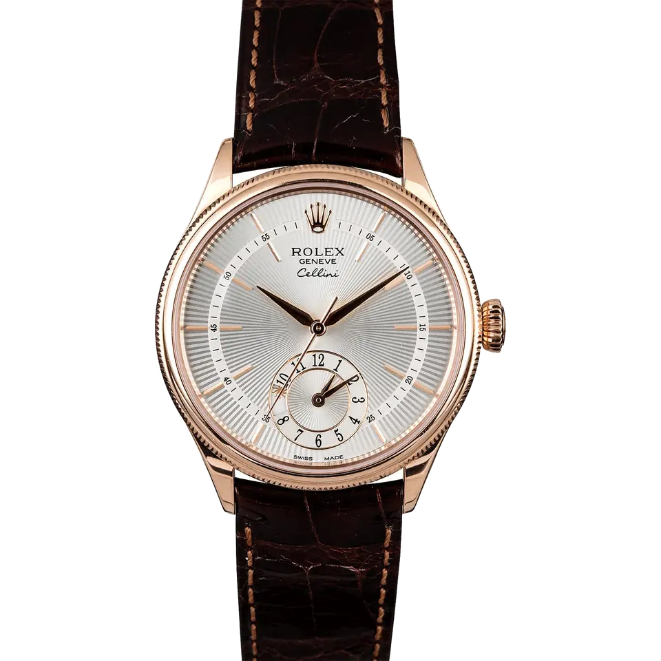 Rolex Cellini Dual Time 50525 with a silver guilloché dial with second time zone sub-dial and fluted Everose bezel on a brown leather strap, a pre-owned example, front view of the whole watch