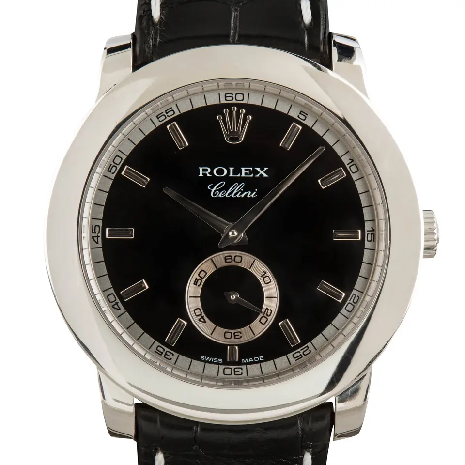 Rolex Cellini 5241 with a black dial with small seconds, round platinum case on a black leather strap, a pre-owned example, studio close-up of the case