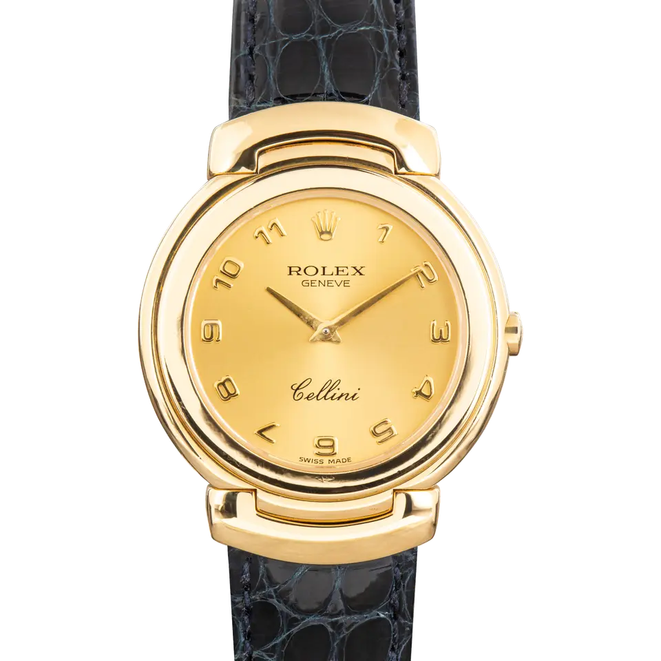 Rolex Cellini 6622 with a champagne Arabic-numeral dial, yellow gold Cellinium case on a navy leather strap, a pre-owned example, front view of the whole watch