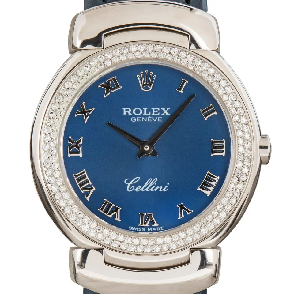Rolex Cellini 6671 with a blue Roman-numeral dial, diamond-set white gold Cellinium case and white gold bracelet, a pre-owned example, studio close-up of the case