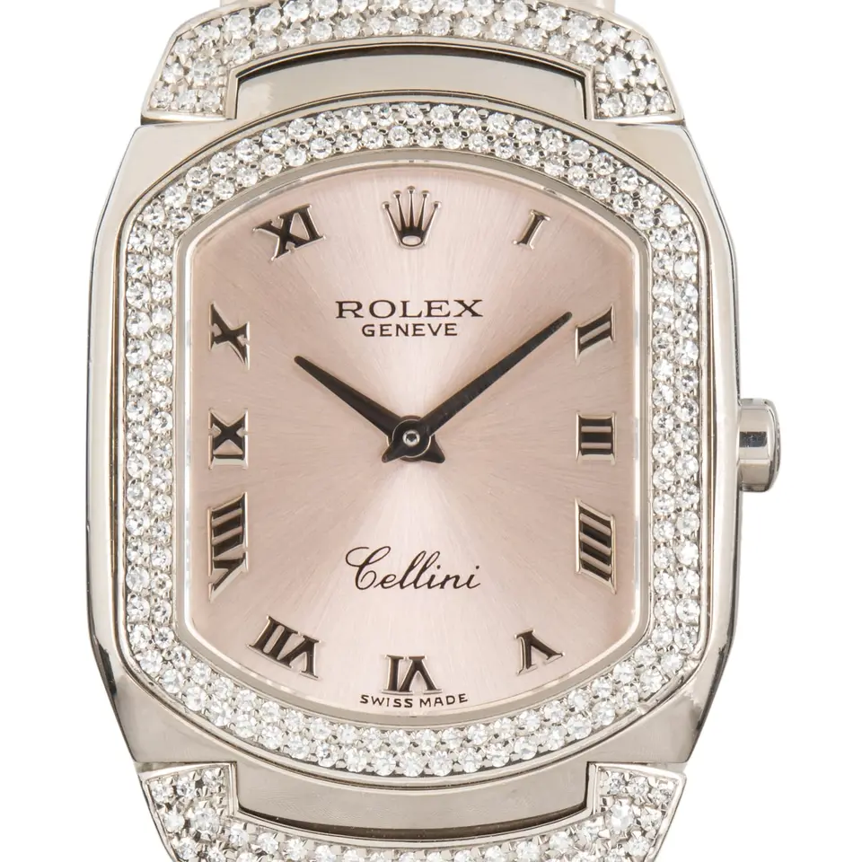 Rolex Cellini 6693 with a pink Roman-numeral dial, diamond-set white gold cushion case and white gold bracelet, a pre-owned example, studio close-up of the case