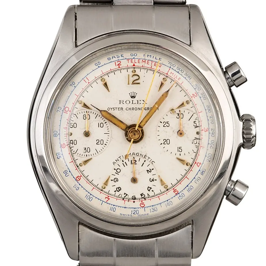 Rolex Chronograph 6034 with a white chronograph dial with tachymeter scale, steel case and steel Oyster bracelet, a pre-owned example, studio close-up of the case