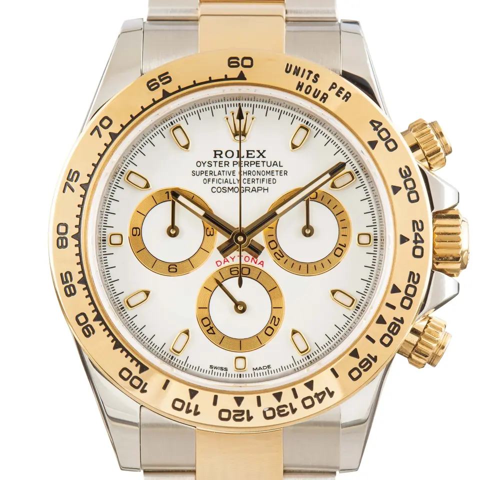 Rolex Cosmograph Daytona 116503 with a white dial with gold-ringed sub-dials in steel and yellow gold on an Oyster bracelet, a pre-owned example, studio close-up of the case