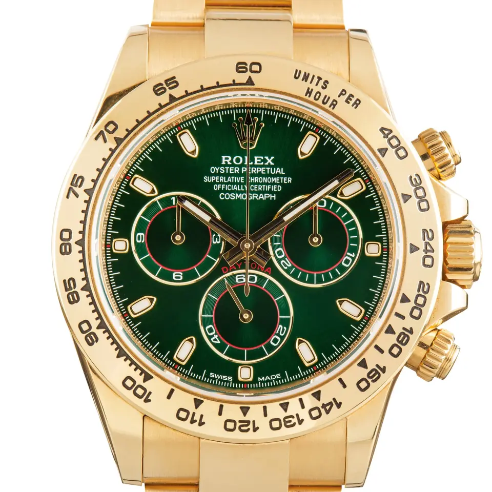 Rolex Cosmograph Daytona 116508 with a green dial with gold tachymeter bezel in yellow gold on an Oyster bracelet, a pre-owned example, studio close-up of the case