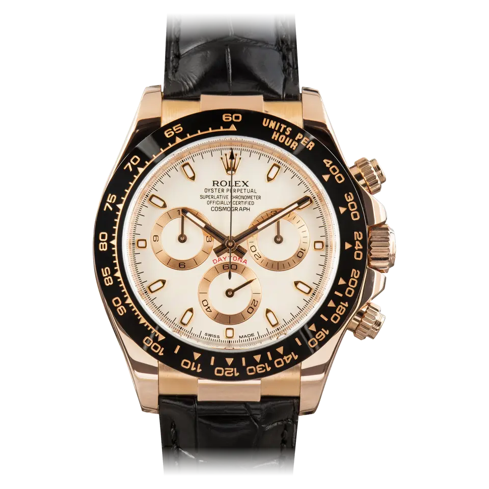 Rolex Cosmograph Daytona 116515LN with an ivory dial with gold counters and a black ceramic tachymeter bezel in Everose gold on a black strap, a pre-owned example, front view of the whole watch