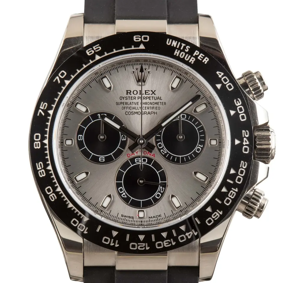 Rolex Cosmograph Daytona 116519 with a steel-grey dial with black sub-dials in white gold on a black Oysterflex strap, a pre-owned example, studio close-up of the case