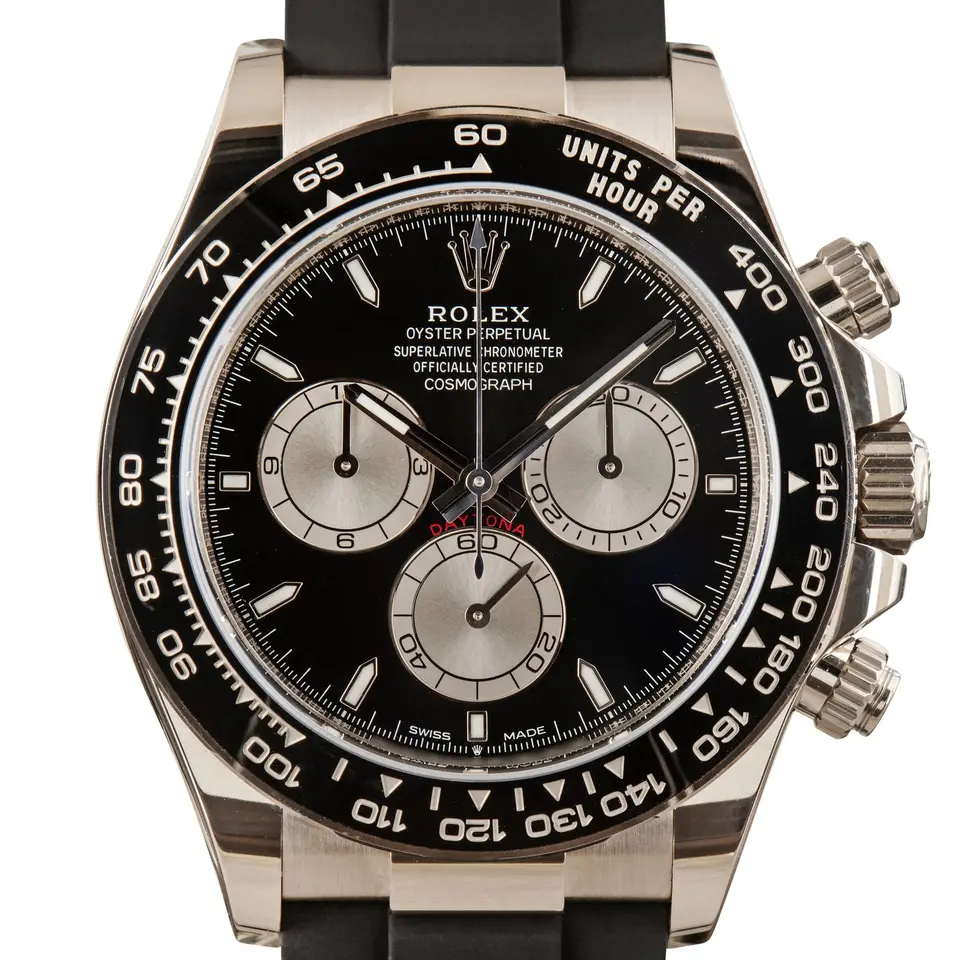 Rolex Cosmograph Daytona 126519LN with a black dial with silver counters and a black ceramic bezel, a pre-owned example, studio close-up of the case