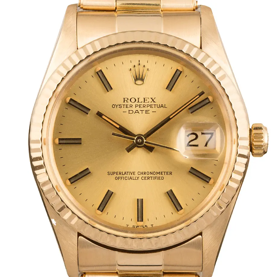 Rolex Oyster Perpetual Date 34 15038 with a champagne dial, fluted yellow gold bezel and yellow gold Oyster bracelet, a pre-owned example, studio close-up of the case