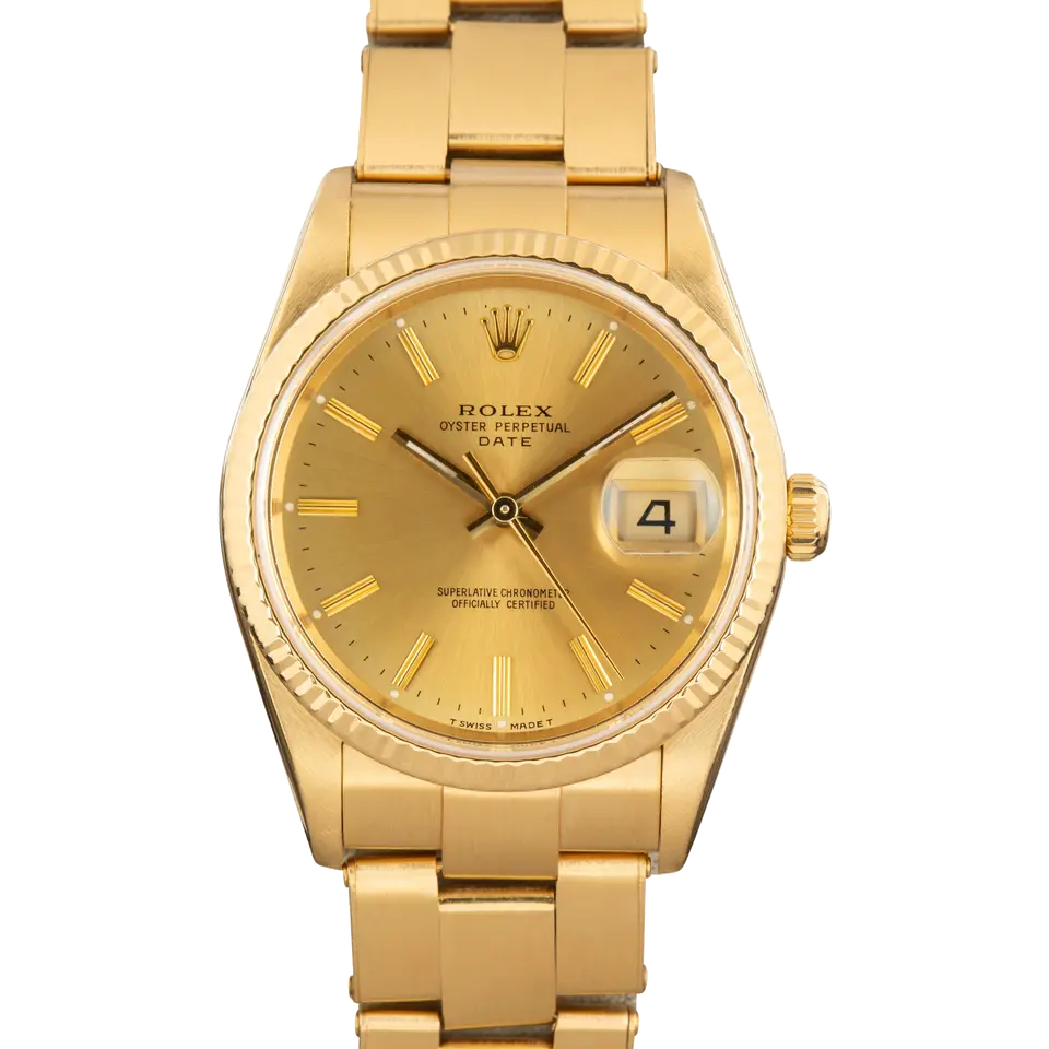 Rolex Oyster Perpetual Date 34 15238 with a champagne dial, fluted yellow gold bezel and yellow gold Oyster bracelet, a pre-owned example, front view of the whole watch