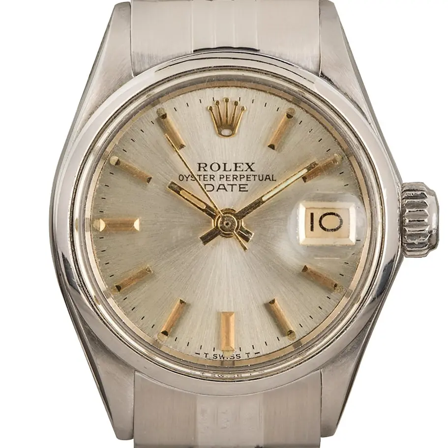 Rolex Date 6519 with a silver dial, smooth steel bezel and steel Oyster bracelet, a pre-owned example, studio close-up of the case