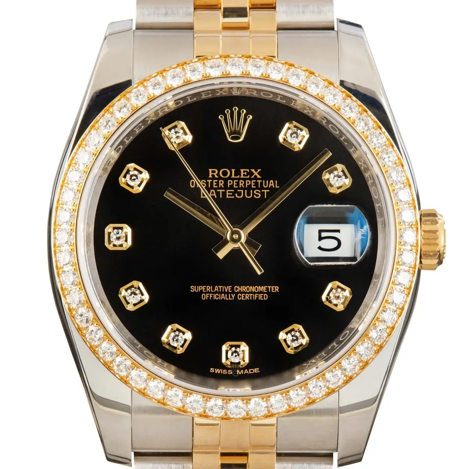 Rolex Datejust 36 116243 with a black dial with diamond markers and diamond-set yellow gold bezel in steel and yellow gold on a Jubilee bracelet, a pre-owned example, studio close-up of the case