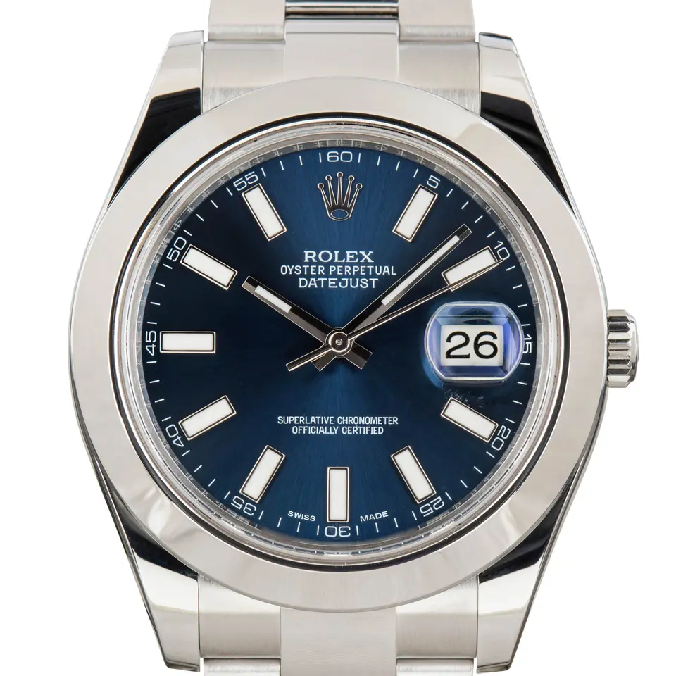 Rolex Datejust II 116300 with a blue dial and smooth steel bezel on an Oyster bracelet, a pre-owned example, studio close-up of the case