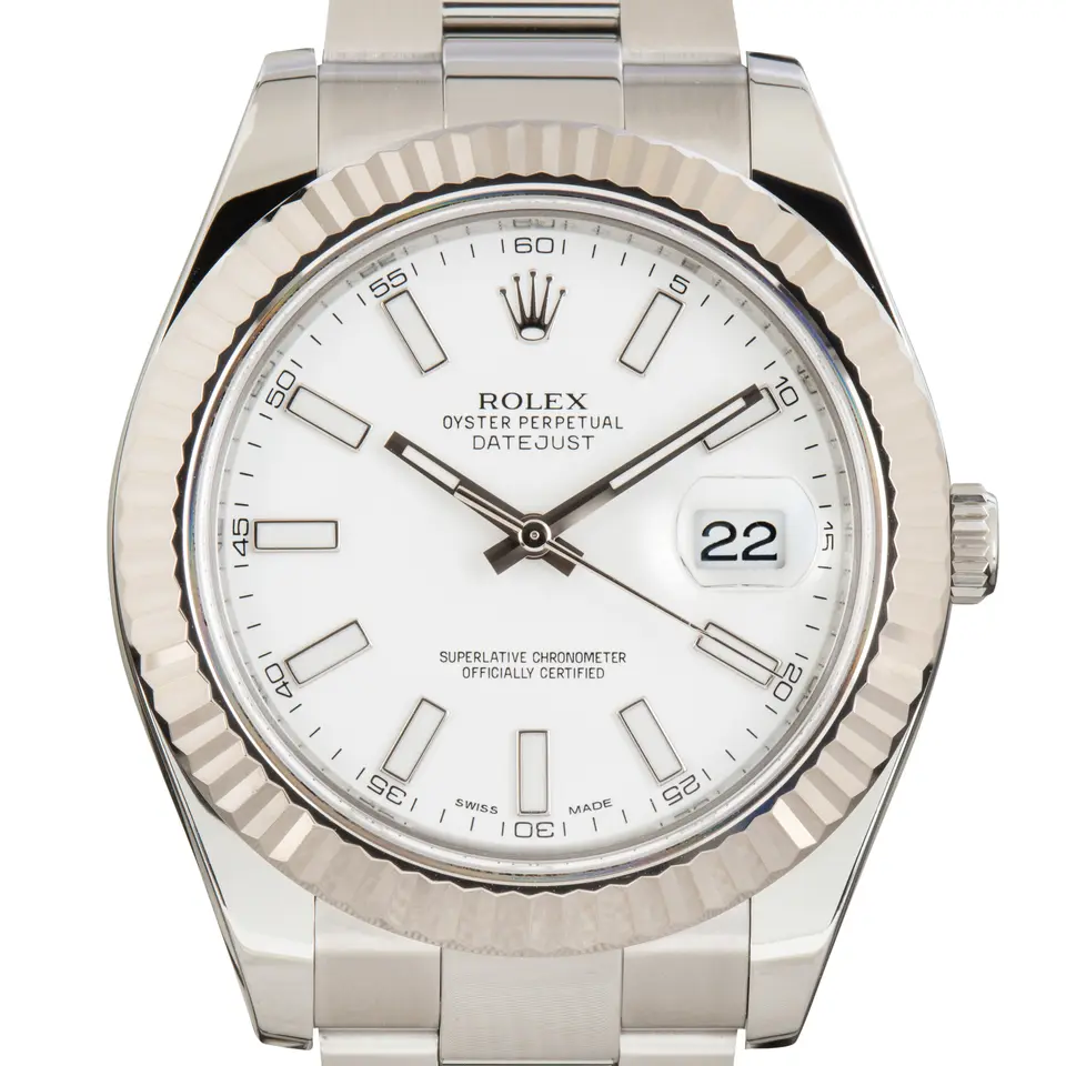 Rolex Datejust II 116334 with a white dial and fluted white gold bezel on a steel Oyster bracelet, a pre-owned example, studio close-up of the case