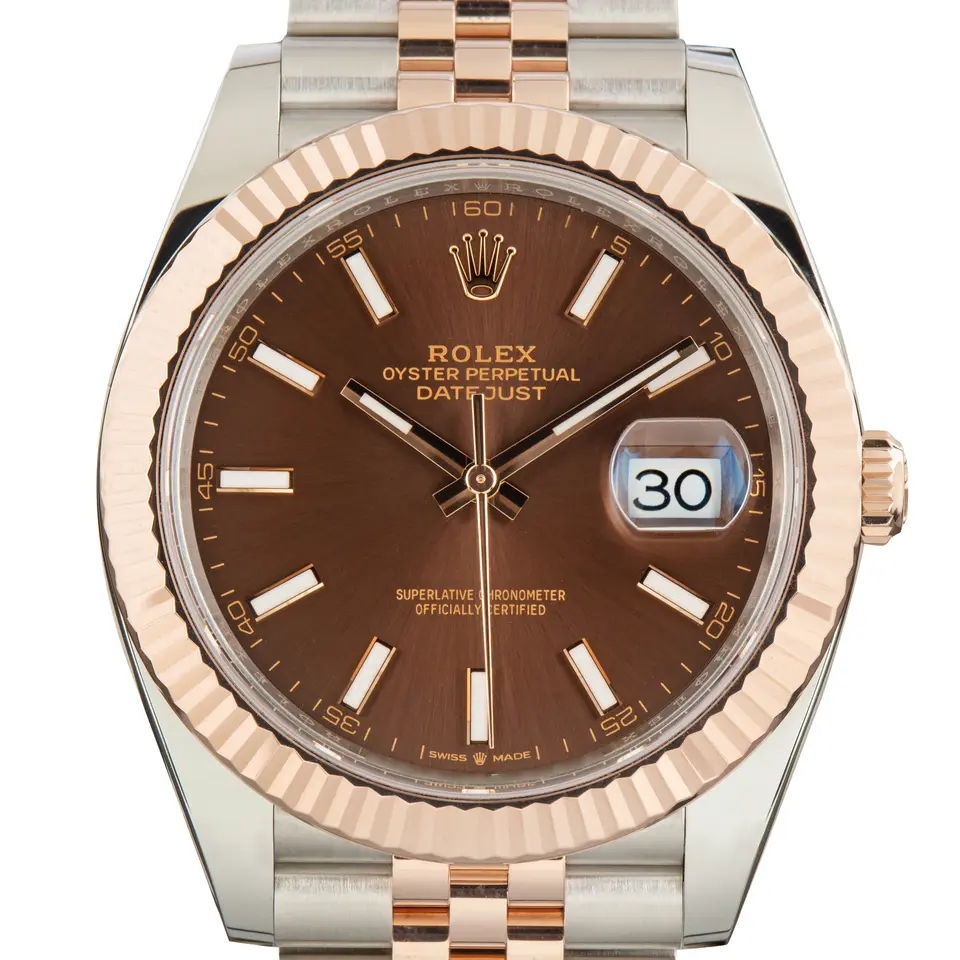 Rolex Datejust 41 126331 with a chocolate dial and a fluted Everose gold bezel, a pre-owned example, studio close-up of the case