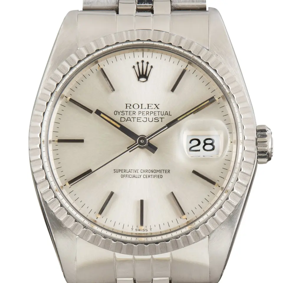 Rolex Datejust 16030 with a silver dial and engine-turned steel bezel on a Jubilee bracelet, a pre-owned example, studio close-up of the case