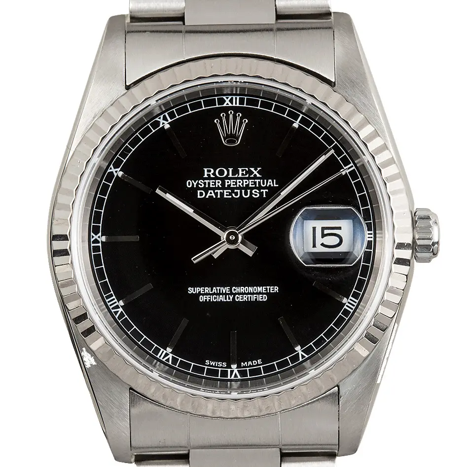 Rolex Datejust 16234 with a black dial and fluted white gold bezel on a steel Oyster bracelet, a pre-owned example, studio close-up of the case