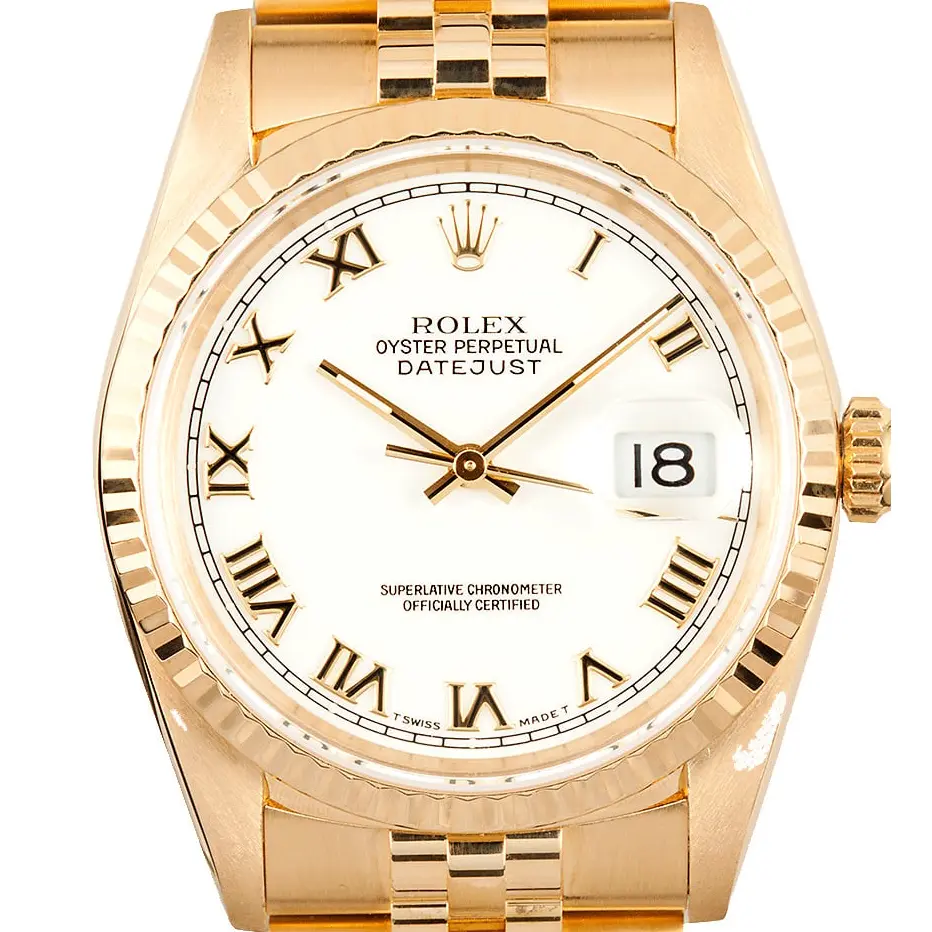 Rolex Datejust 36 16238 with a white Roman-numeral dial, fluted yellow gold bezel and yellow gold Jubilee bracelet, a pre-owned example, studio close-up of the case