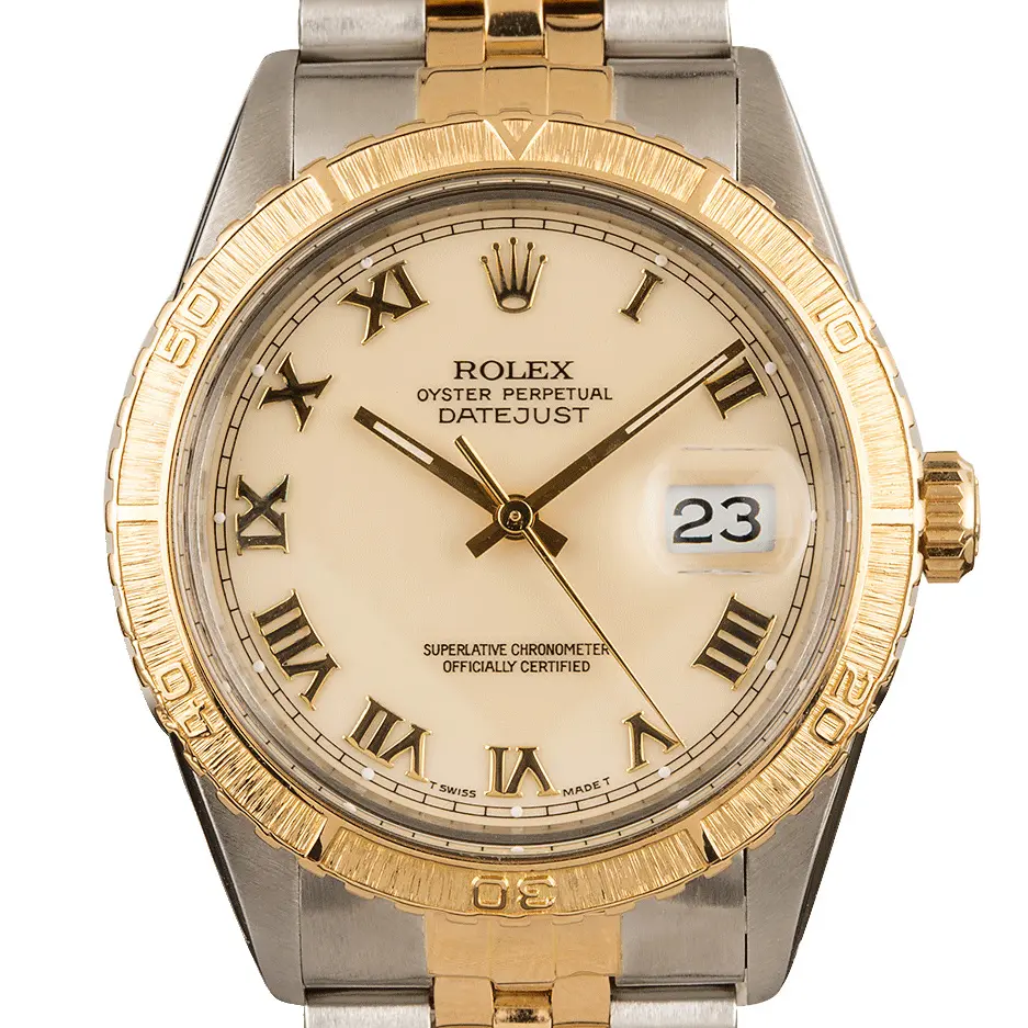 Rolex Turn-O-Graph 16253 with a cream Roman-numeral dial, yellow gold Thunderbird bezel and steel and gold Jubilee bracelet, a pre-owned example, studio close-up of the case