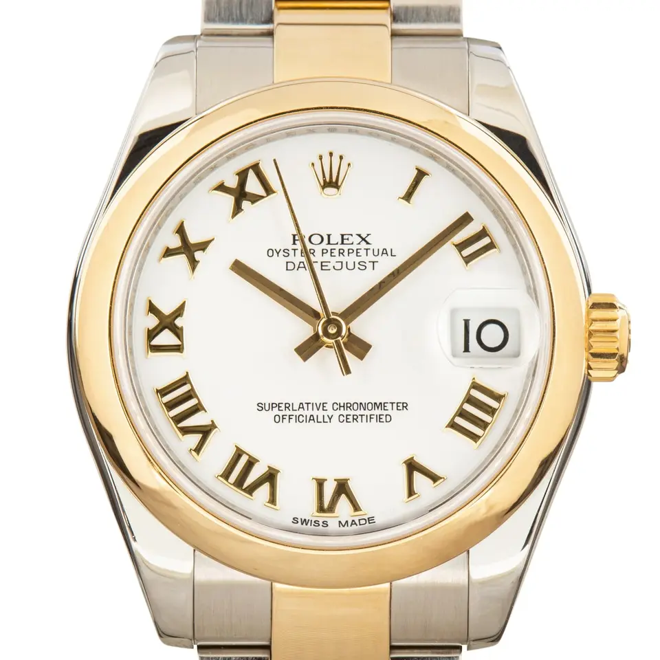 Rolex Datejust 31 178243 with a white dial with Roman numerals and smooth yellow gold bezel in steel and yellow gold on an Oyster bracelet, a pre-owned example, studio close-up of the case