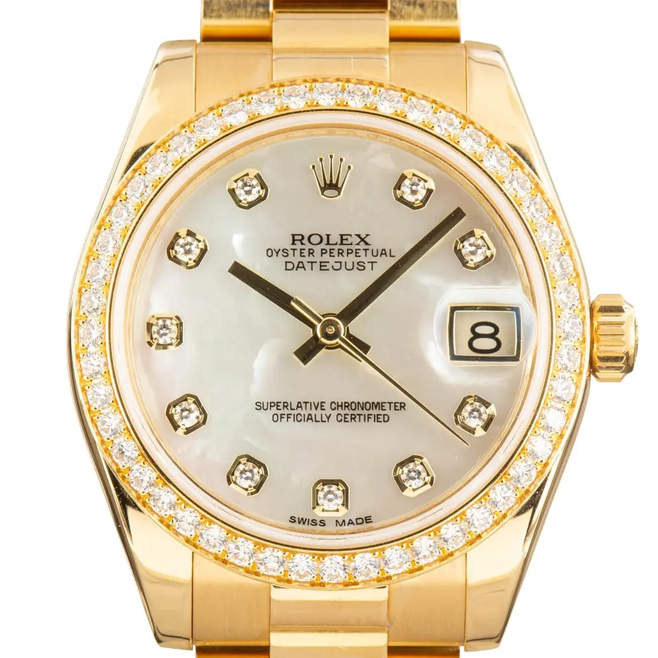 Rolex Datejust 31 178288 with a mother-of-pearl dial with diamond hour markers, diamond-set bezel and yellow gold Jubilee bracelet, a pre-owned example, studio close-up of the case