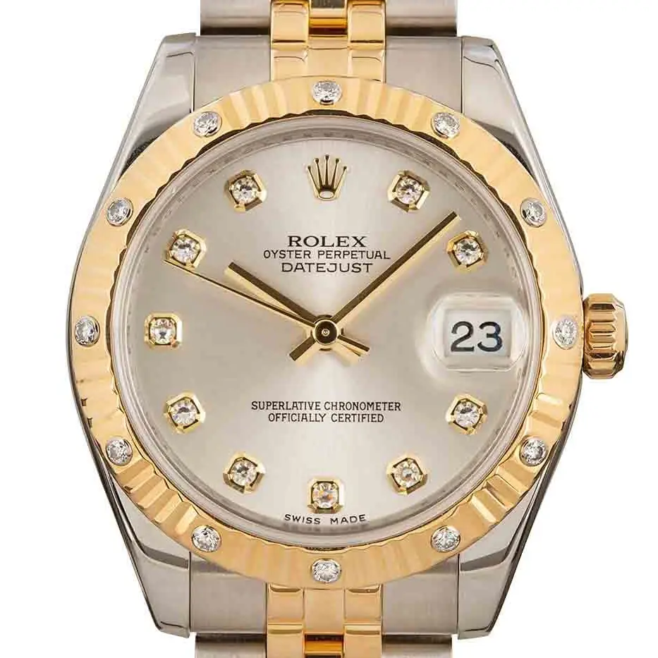 Rolex Datejust 31 178313 with a silver dial with diamond hour markers, yellow gold bezel with diamonds and steel and gold Jubilee bracelet, a pre-owned example, studio close-up of the case