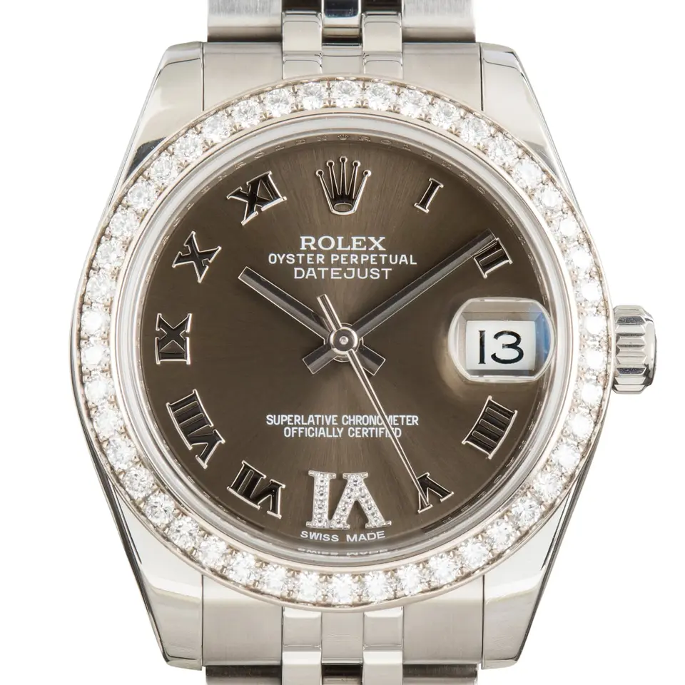 Rolex Datejust 31 178384 with a bronze dial with Roman numerals and diamond-set white gold bezel on a steel Jubilee bracelet, a pre-owned example, studio close-up of the case