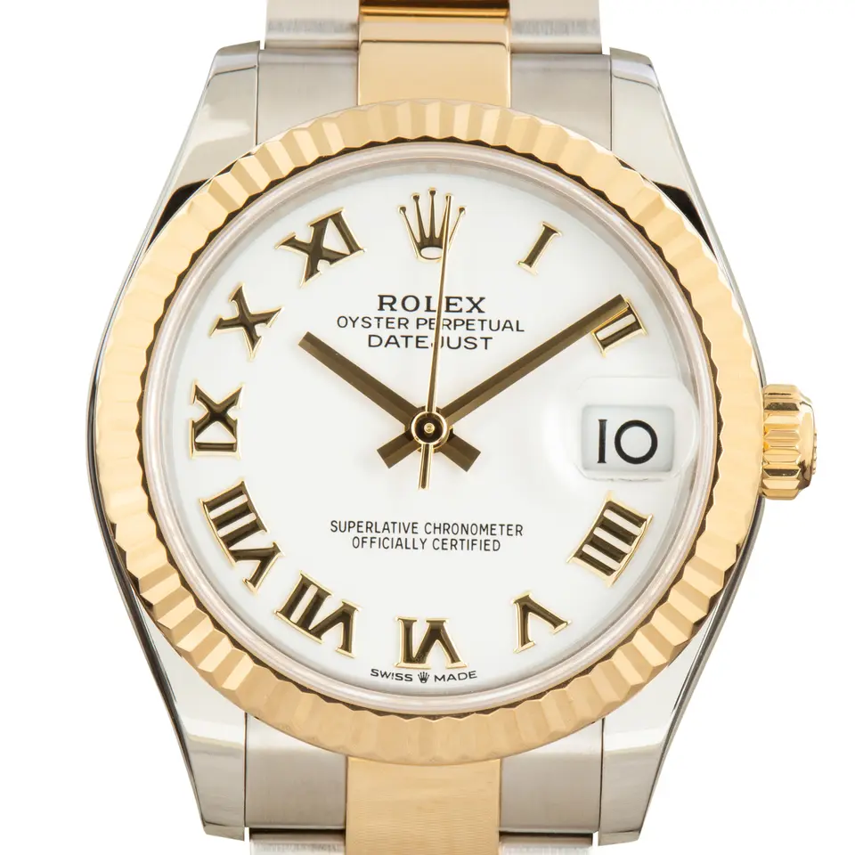 Rolex Datejust 31 278273 with a white dial with Roman numerals and a fluted yellow gold bezel, a pre-owned example, studio close-up of the case