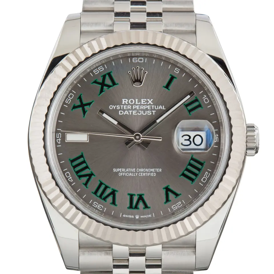Rolex Datejust 41 126334 with the slate Wimbledon dial with green Roman numerals and a fluted white gold bezel, a pre-owned example, studio close-up of the case