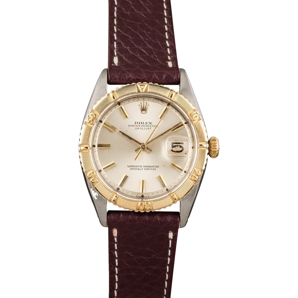 Rolex Datejust Turn-O-Graph 6609 with a silver dial, yellow gold Turn-O-Graph bezel and steel and gold case on a burgundy leather strap, a pre-owned example, front view of the whole watch