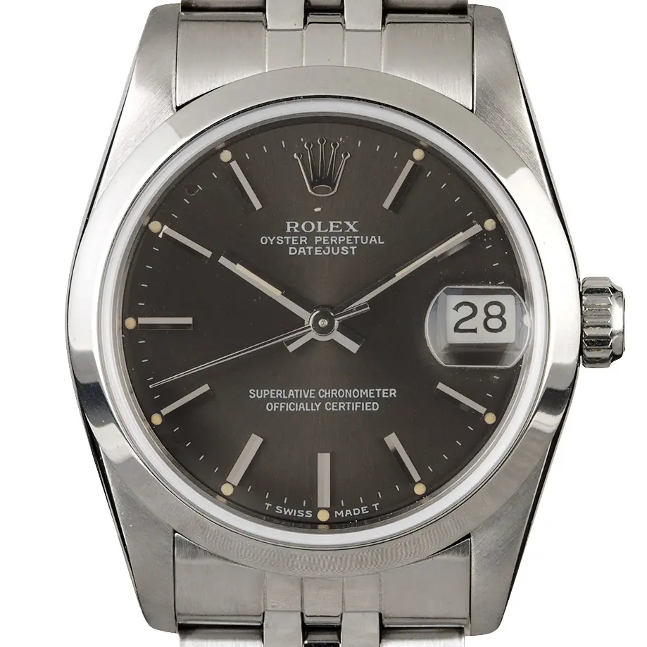 Rolex Datejust 31 68240 with a slate grey dial, smooth steel bezel and steel Jubilee bracelet, a pre-owned example, studio close-up of the case