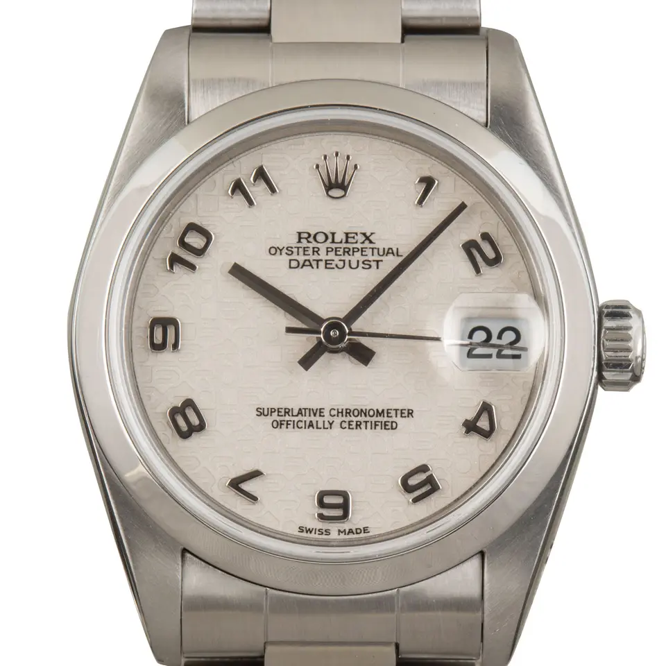 Rolex Datejust 31 78240 with a white Arabic-numeral dial, smooth steel bezel and steel Oyster bracelet, a pre-owned example, studio close-up of the case