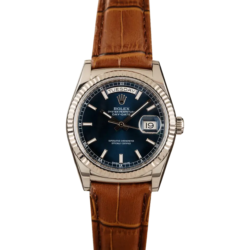 Rolex Day-Date 36 118139 with a blue dial and fluted bezel in white gold on a brown leather strap, a pre-owned example, front view of the whole watch