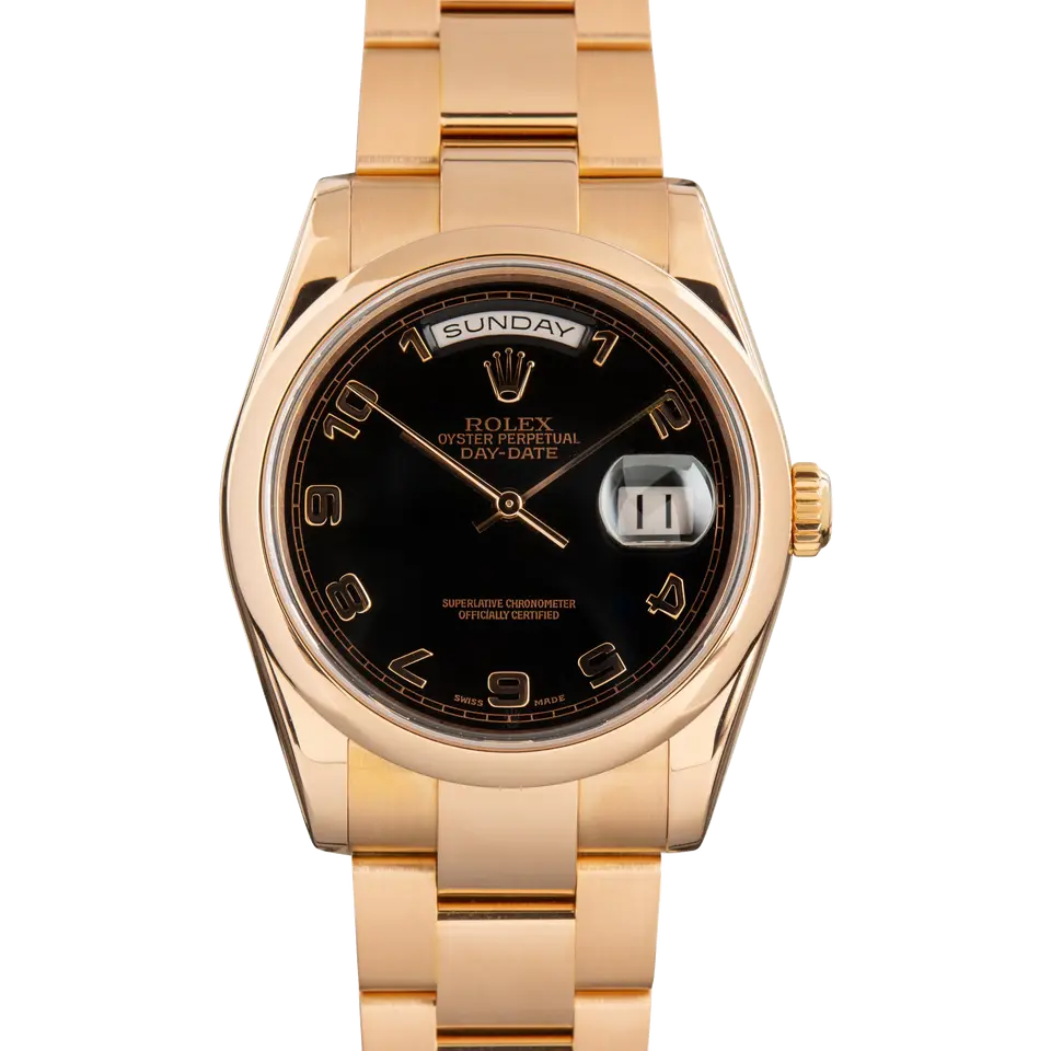 Rolex Day-Date 36 118205 with a black dial with Arabic numerals and smooth bezel in Everose gold on an Oyster bracelet, a pre-owned example, front view of the whole watch