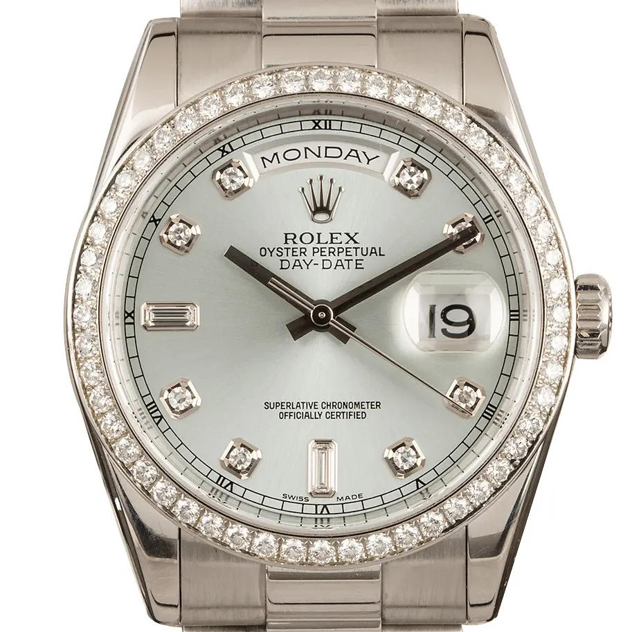 Rolex Day-Date 36 118346 with an ice blue dial with diamond markers and diamond-set bezel in platinum on a President bracelet, a pre-owned example, studio close-up of the case