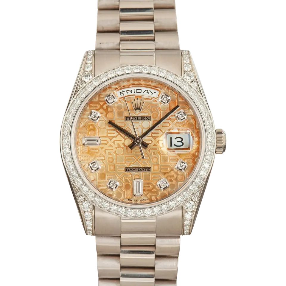 Rolex Day-Date 36 118389 with a salmon Jubilee-pattern dial with diamond markers, diamond-set bezel and lugs in white gold on a President bracelet, a pre-owned example, front view of the whole watch