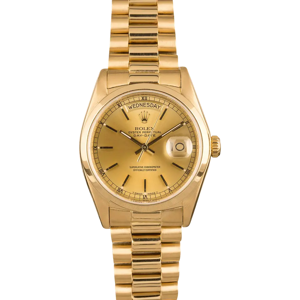 Rolex Day-Date 36 18028 with a champagne dial and fluted bezel in yellow gold on a President bracelet, a pre-owned example, front view of the whole watch