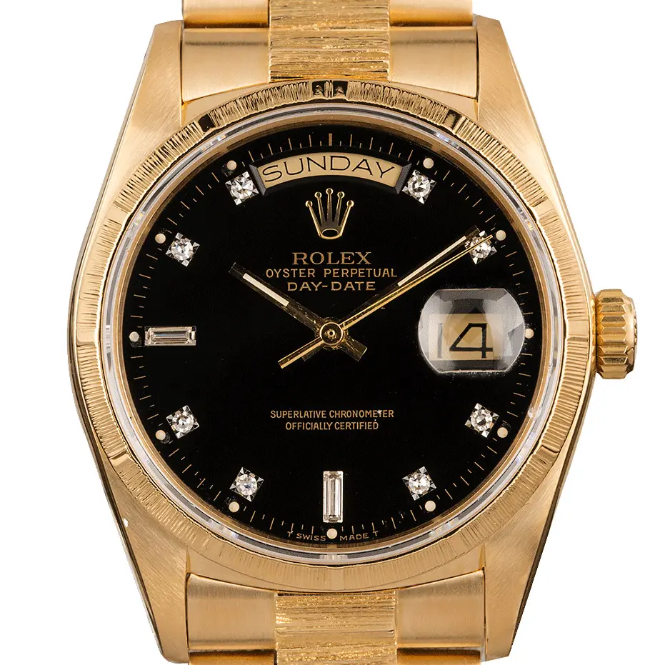 Rolex Day-Date 36 18078 with a black dial with diamond markers in bark-finished yellow gold on a bark-finished President bracelet, a pre-owned example, studio close-up of the case