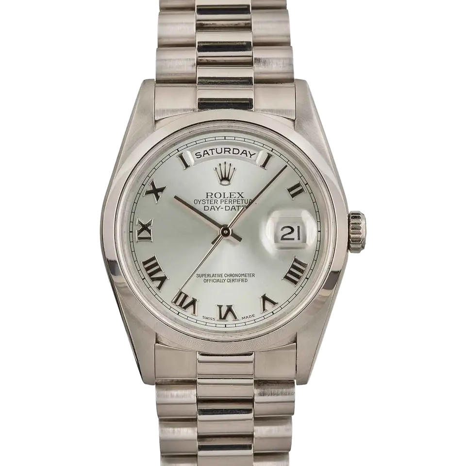 Rolex Day-Date 36 18206 with a silver dial with Roman numerals and smooth bezel in platinum on a President bracelet, a pre-owned example, front view of the whole watch