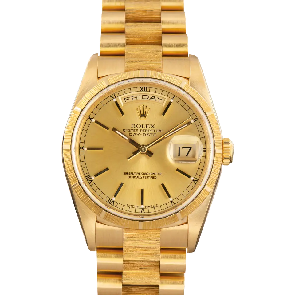 Rolex Day-Date 36 18248 with a champagne dial, bark-finish yellow gold bezel and bark-finish President bracelet, a pre-owned example, front view of the whole watch
