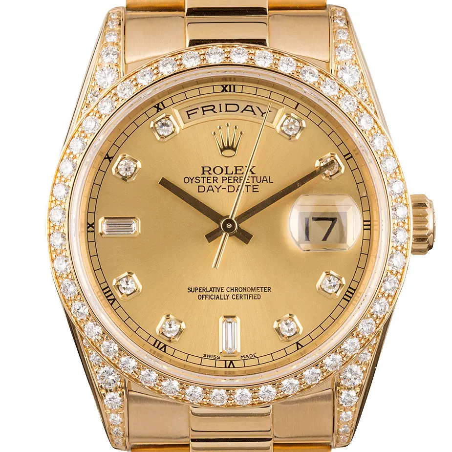 Rolex Day-Date 36 18388 with a champagne dial with diamond hour markers, diamond-set bezel, diamond-set lugs and yellow gold President bracelet, a pre-owned example, studio close-up of the case