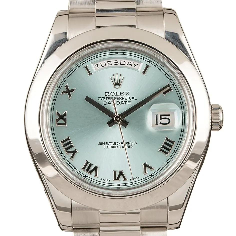 Rolex Day-Date II 218206 with an ice blue dial with Roman numerals and smooth bezel in platinum on a President bracelet, a pre-owned example, studio close-up of the case
