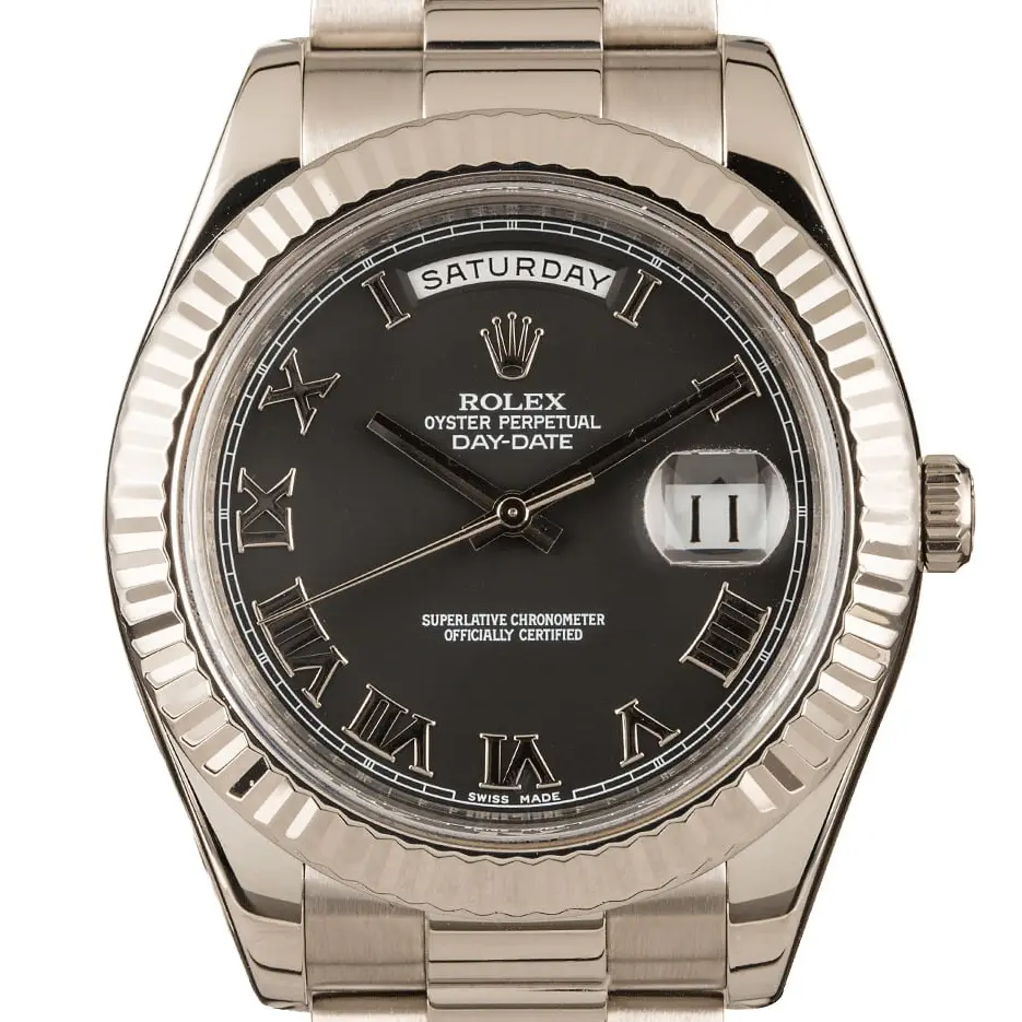 Rolex Day-Date II 218239 with a dark grey dial with Roman numerals and fluted bezel in white gold on a President bracelet, a pre-owned example, studio close-up of the case