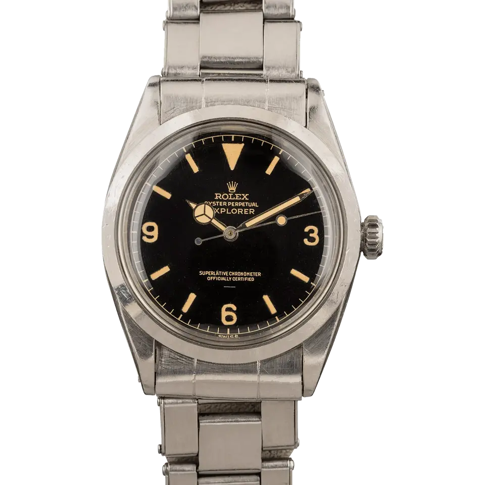 Rolex Explorer 1016 with a glossy black gilt dial with 3, 6 and 9 numerals on a steel Oyster bracelet, a pre-owned example, front view of the whole watch